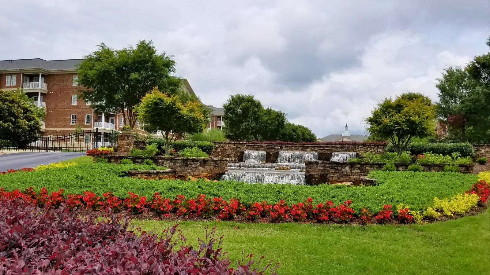 hardscape with flowers and fountain