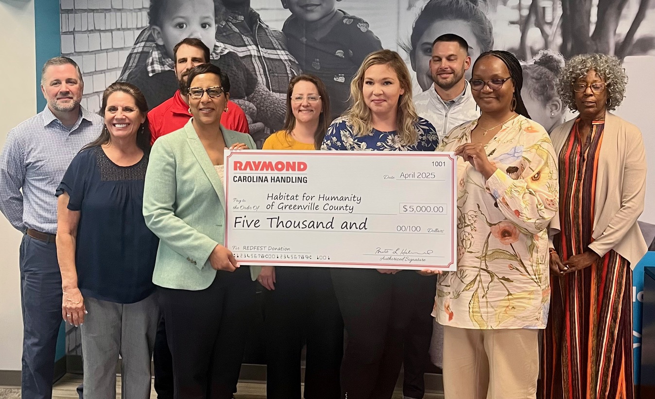 Carolina Handling pledges support, donation to Habitat Greenville